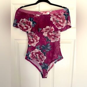 Charlotte Russe semi-sheer body suit. Size M, only worn once.